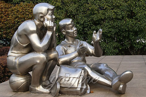 Outdoor abstract stainless steel two boy reading sculptures for school or garden for Sale